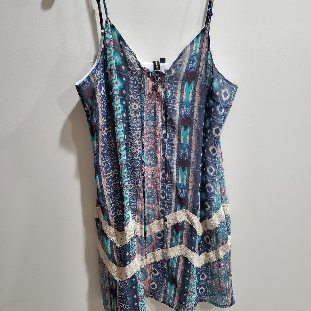 Multi colored mini dress with lining.